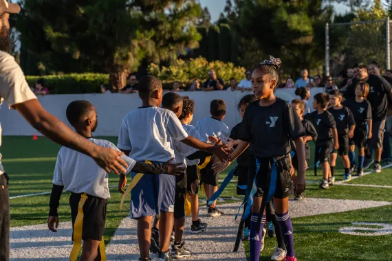 kids giving each other five