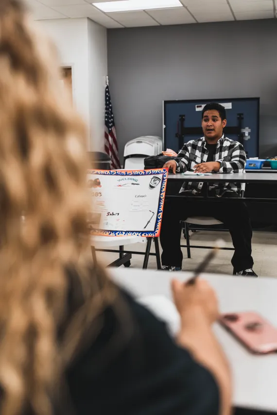 teen giving presentation in career