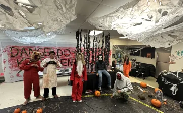 Teens posing for the haunted maze