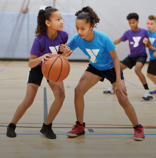 Girls playing basketball at the Y