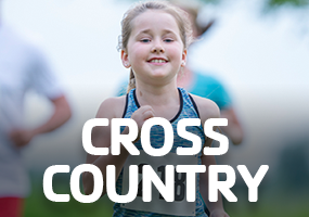 Girl running in a cross country race
