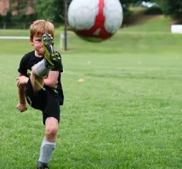 Youth athlete playing soccer
