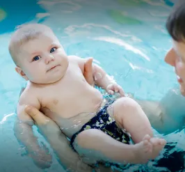 Baby in the Pool with Dad