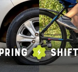 half of a car wheel merged with half of a bike wheel; text that says spring shift